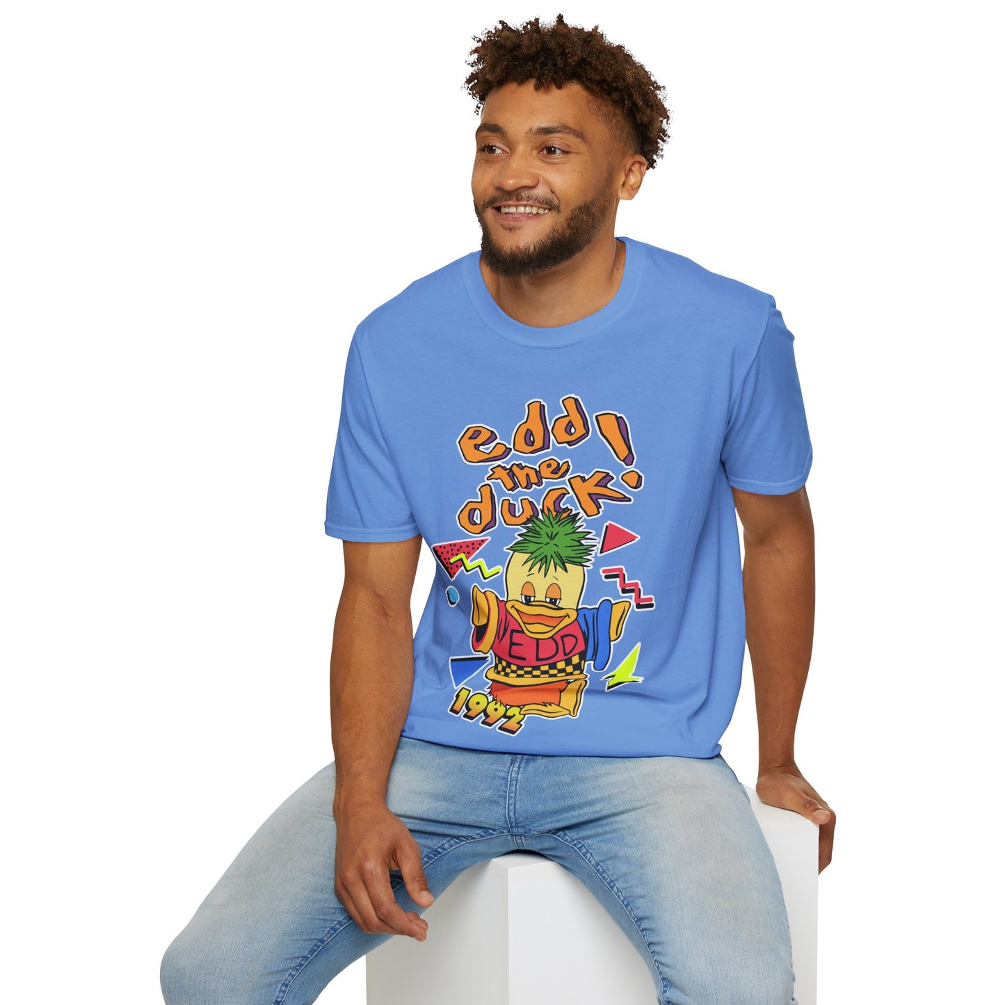 Man wearing a blue t-shirt with a 90s broom cupboard 'Edd The Duck' character design on a white background