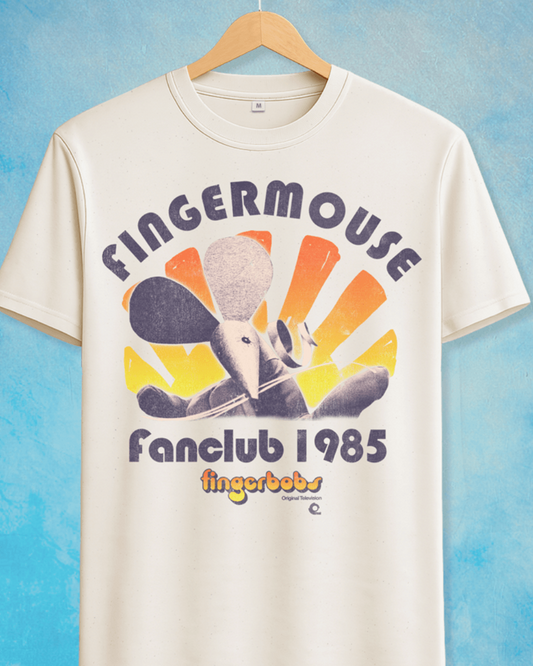 An off-white short-sleeve t-shirt hanging on a wooden hanger against a textured blue background. The shirt features a colorful graphic print of a cartoon finger mouse with the text 'FINGERMOUSE fanclub 1985' and 'fingerbobs' below.