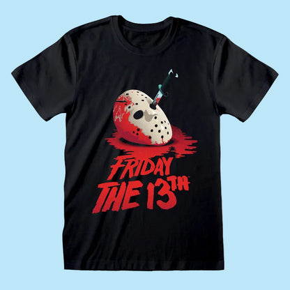 A black short-sleeve t-shirt featuring a graphic of a blood-splattered hockey mask with a knife in its eye, above the distressed red text 'FRIDAY THE 13TH'.