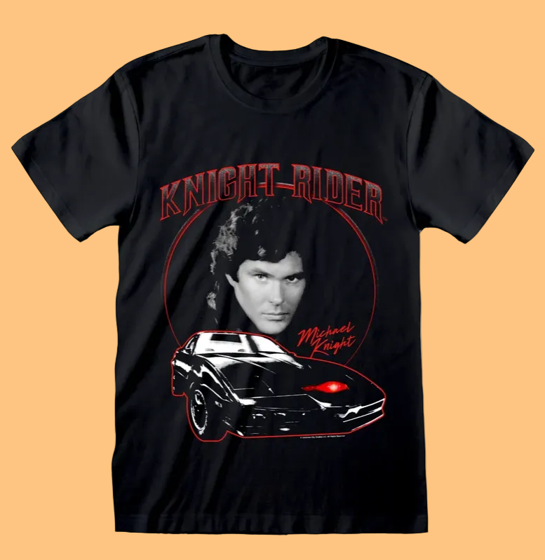 A black short-sleeve graphic t-shirt featuring a 'Knight Rider' design with Michael Knight's portrait, the car, and red text on a white background.