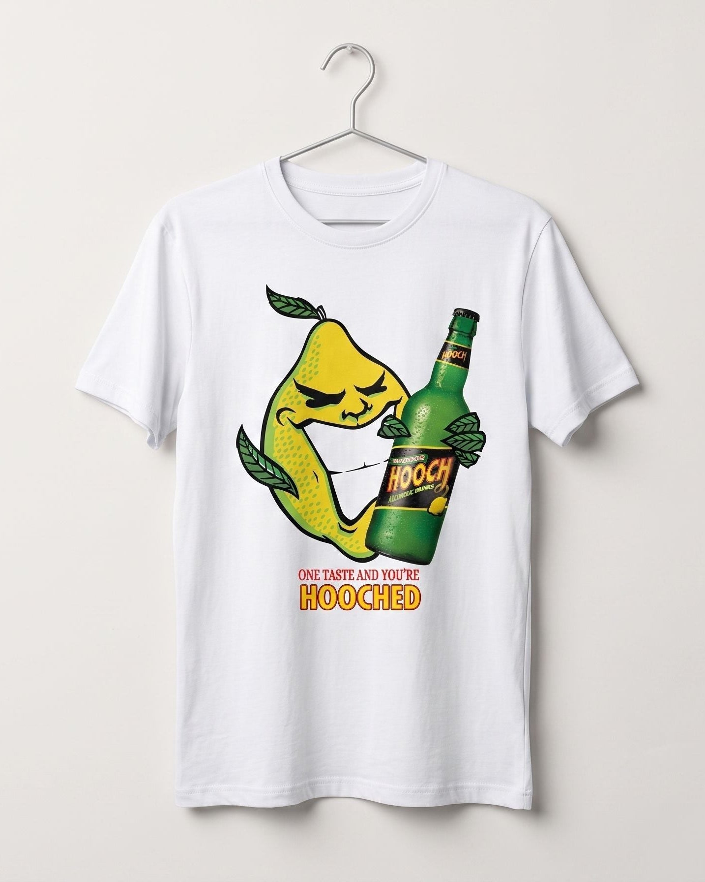 A white short-sleeve t-shirt hanging on a metal hanger against a light beige wall. The shirt features a cartoon graphic of a party lemon holding a green bottle with the text 'ONE TASTE AND YOU'RE HOOCHED' printed below.