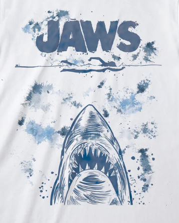 T-shirt with 'JAWS' logo and shark graphic on a white background