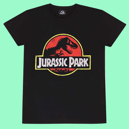 A black short-sleeve crewneck t-shirt featuring the iconic red, yellow, and white Jurassic Park logo printed on the chest.