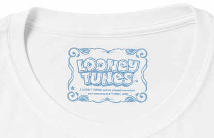 Close-up of a white crewneck t-shirt featuring a light blue graphic print on the inside collar that reads 'Looney Tunes' with trademark text below.