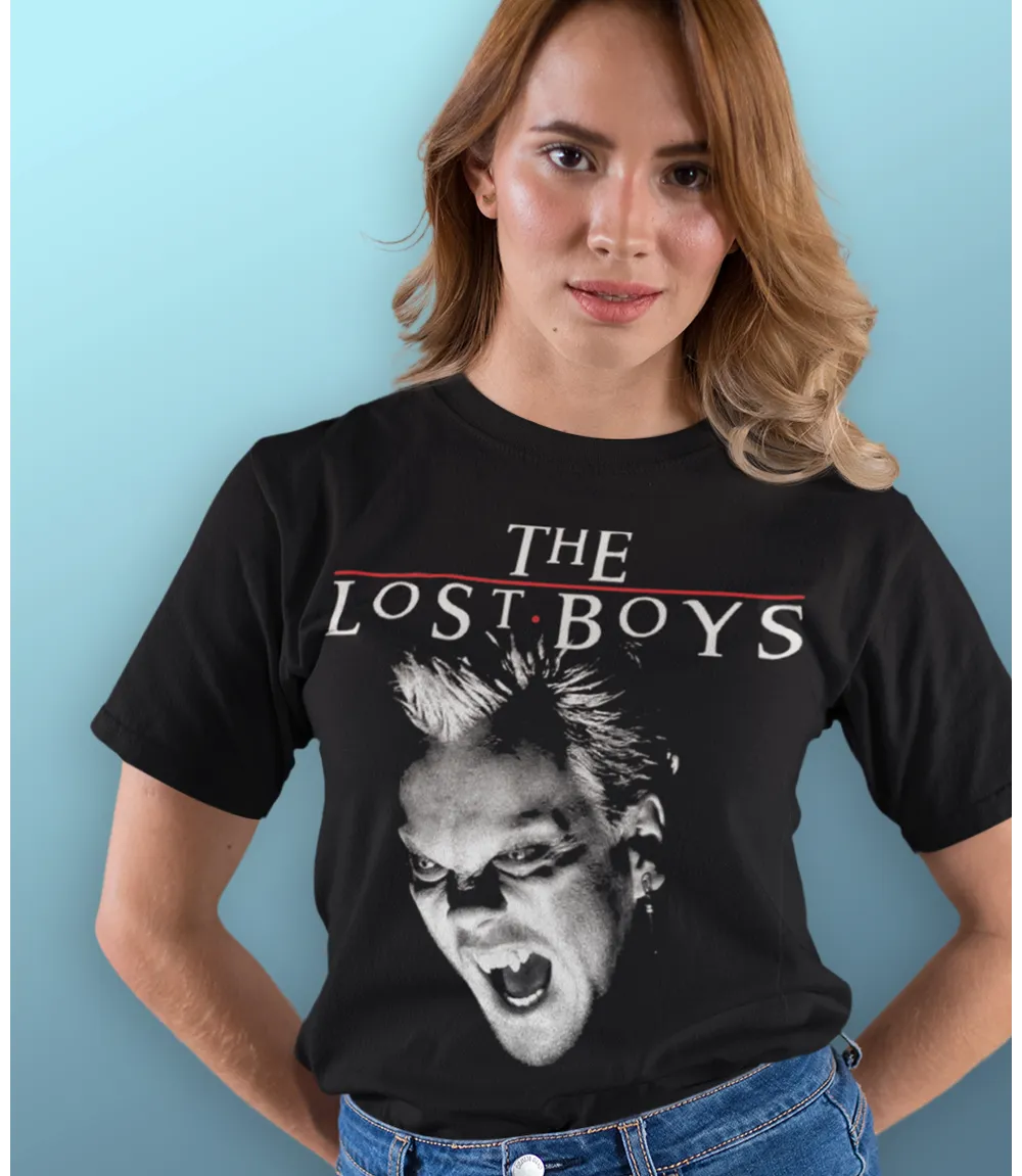 Woman wearing Unisex short sleeve black t-shirt featuring official The Lost Boys 80s Vampire movie David design with The Lost Boys text / Retro Tees