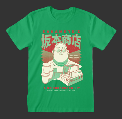 Green t-shirt with a graphic design of Sakamoto Days Hero character and text on a black background