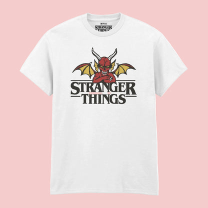 A white short-sleeve crewneck t-shirt featuring a graphic of a red devil with yellow wings above the text 'STRANGER THINGS'. The neck label also displays the 'Stranger Things' logo.