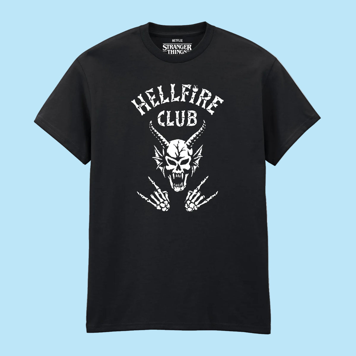 A black short-sleeve crewneck t-shirt featuring a white graphic print of a horned skull with skeletal hands and the text 'HELLFIRE CLUB' on the front. The inner collar label shows the brand 'Stranger Things'.