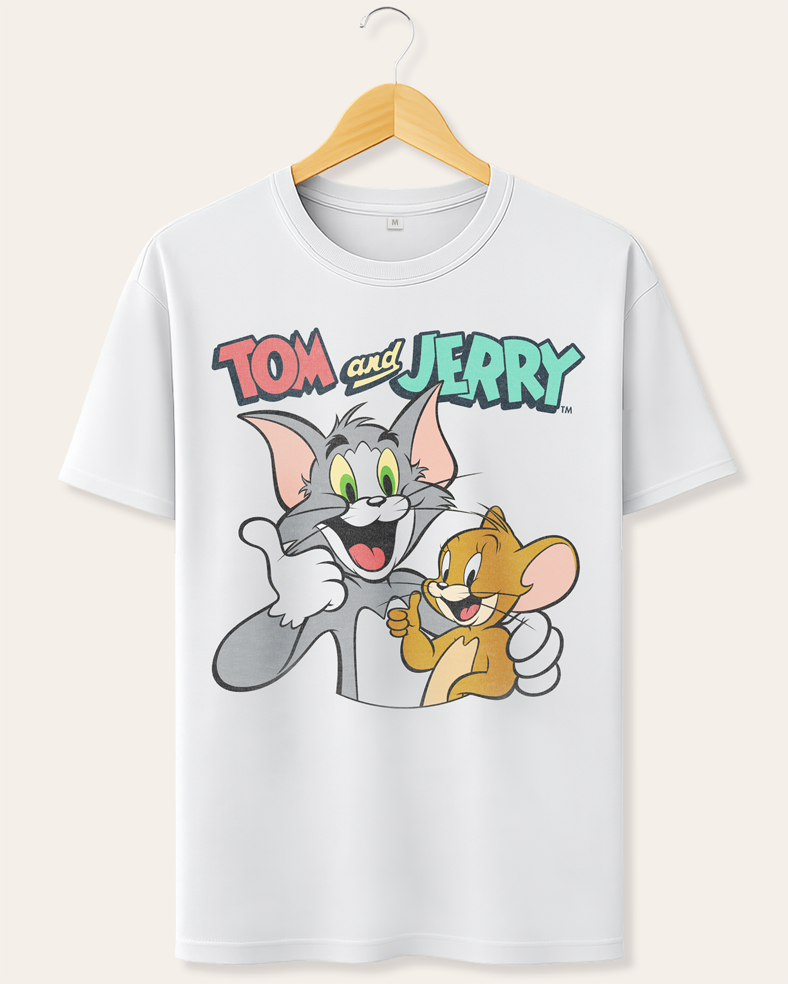 White t-shirt with Tom and Jerry graphic on a hanger against a cream  background