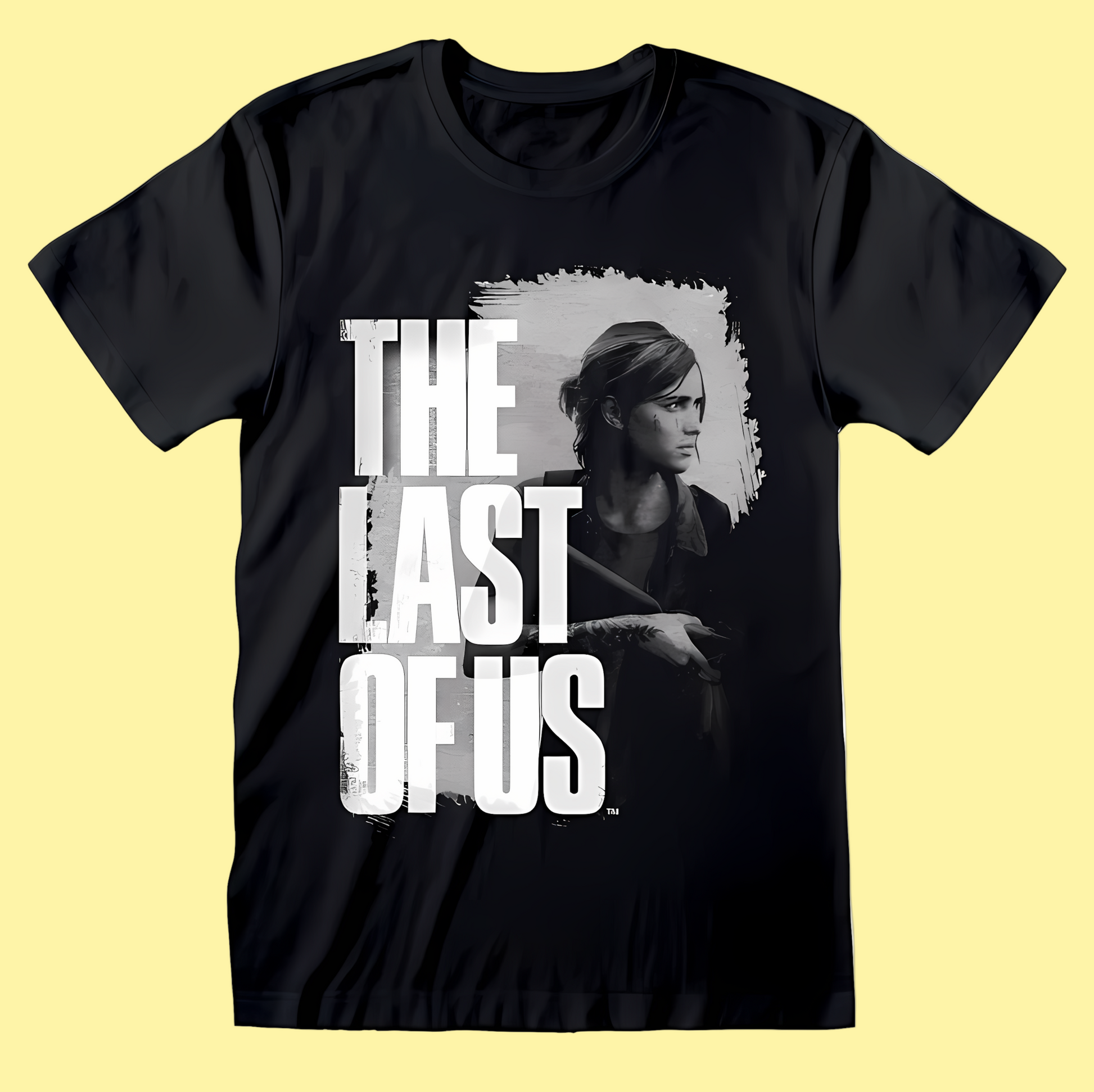 Black t-shirt with 'The Last of Us' graphic design on a white background