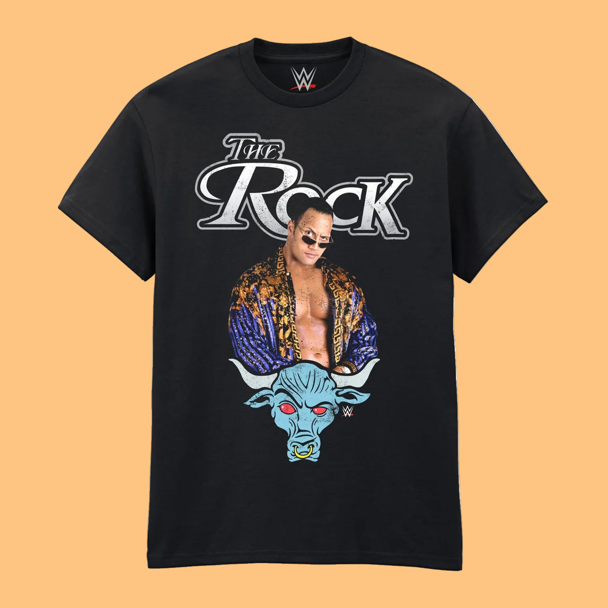 A black short-sleeve crewneck t-shirt featuring a graphic print of WWE wrestler with the text 'The Rock' and a blue bull head illustration below, shown 
