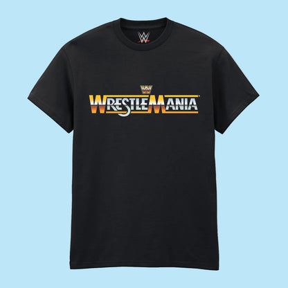 A black short-sleeve crewneck t-shirt featuring a 'WrestleMania' graphic on the chest with WWE branding, displayed