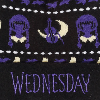 Patterned beanie with characters and 'WEDNESDAY' text on a black background