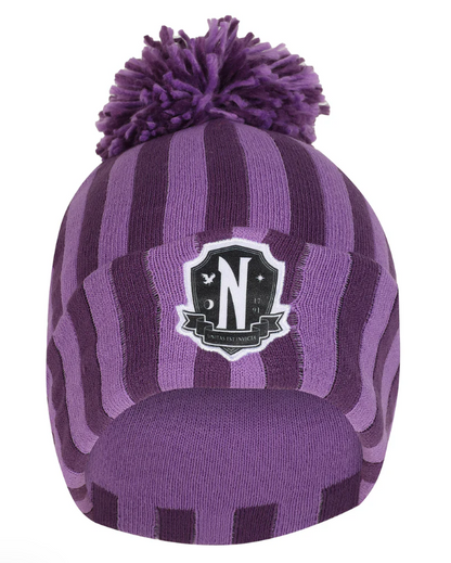 Official Wednesday Purple striped beanie with pom-pom and Nevermore logo on a white background