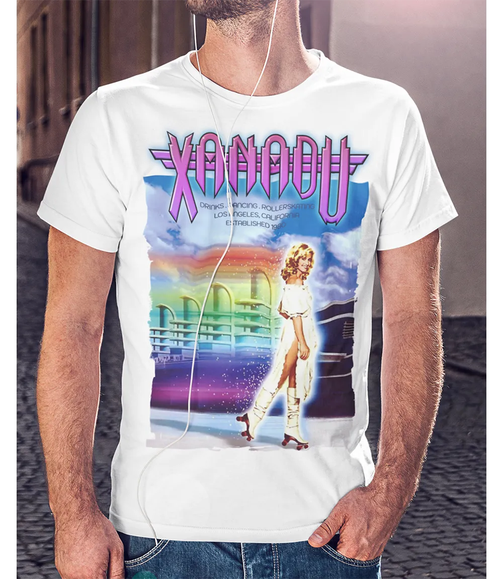 Person wearing a white t-shirt with a colourful graphic design featuring  'Xanadu' retro movie poster print.