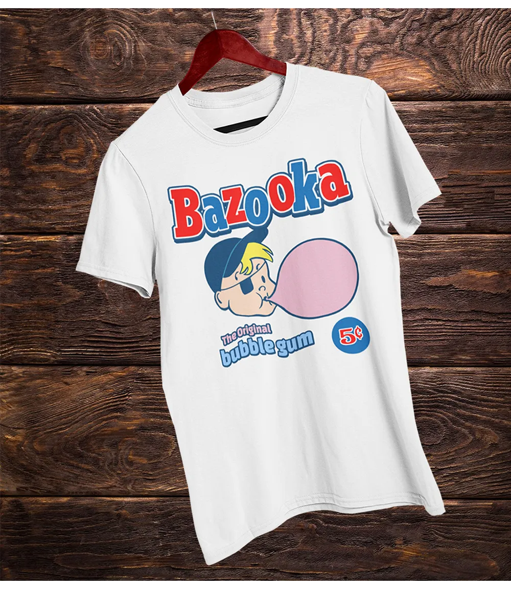 White short sleeve t-shirt with Bazooka bubble gum graphic on a wooden background