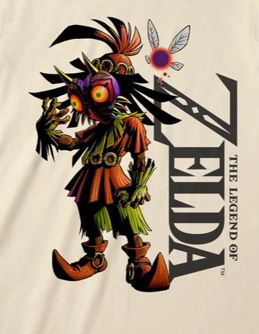 A cream-colored short-sleeve t-shirt featuring a graphic of the character from The Legend of Zelda next to the vertical black text 'THE LEGEND OF ZELDA'.