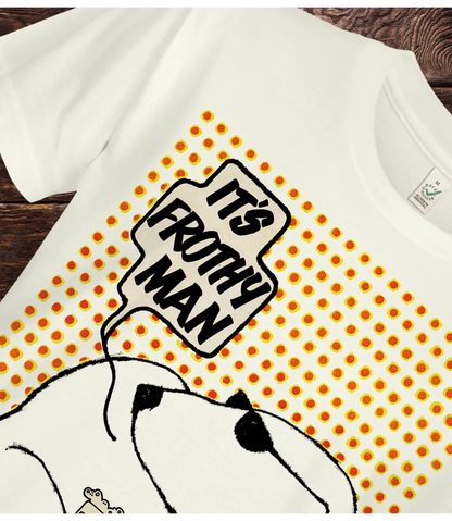 White t-shirt with a graphic design featuring a polar bear and text 'It's Frothy Man' on a wooden surface.