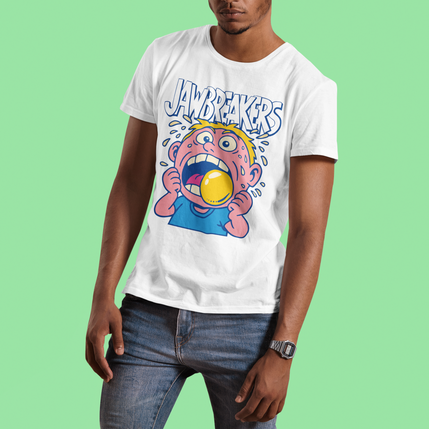Person wearing a short sleeve white retro t-shirt with a colourful 80s graphic and 'Jawbreakers' text