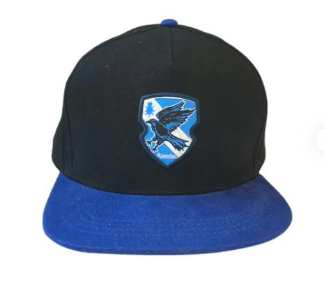 Black and blue cap with a shield emblem featuring an eagle on a white background