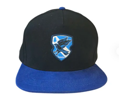 Black and blue cap with a shield emblem featuring an eagle on a white background
