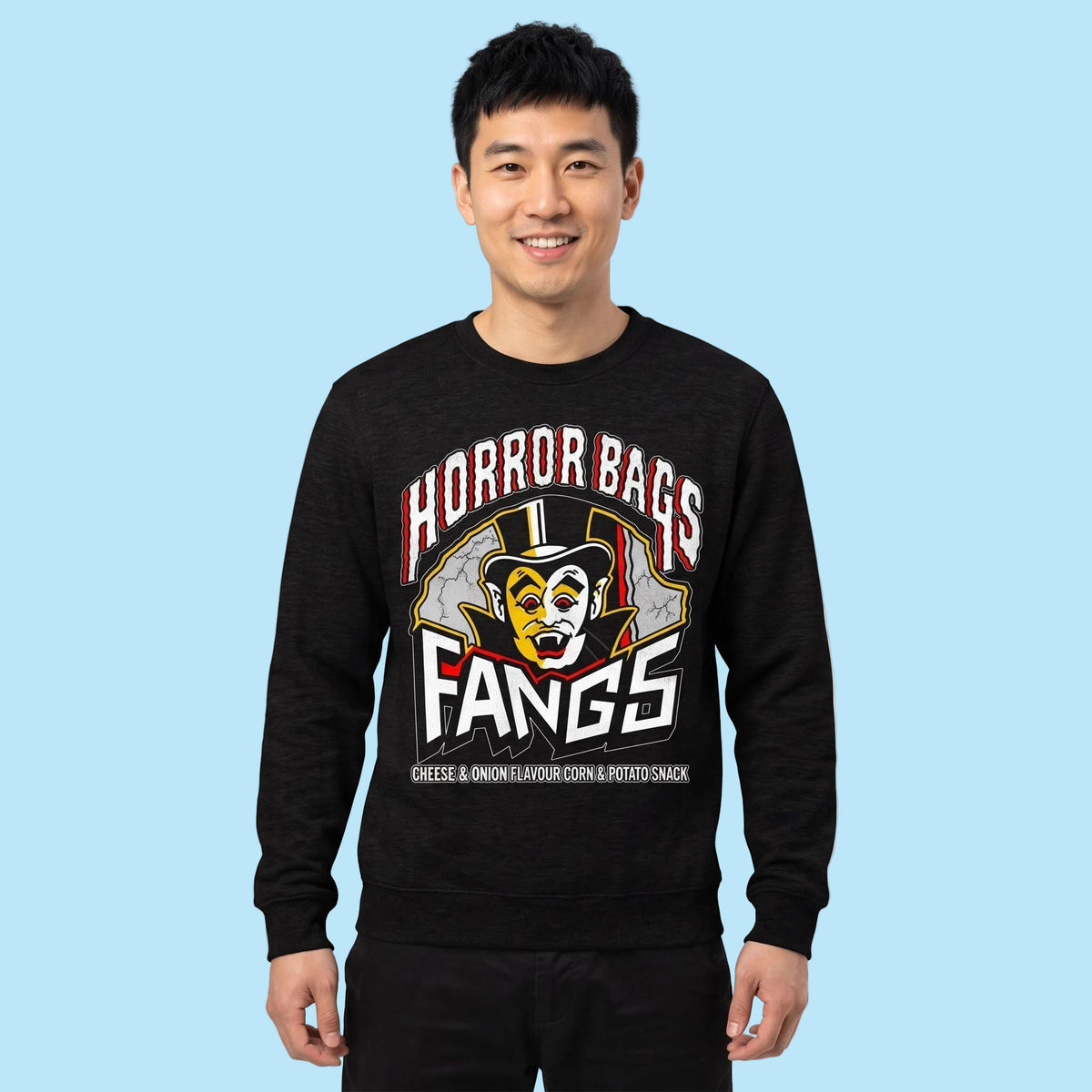 man wearing Black Smoke Printed Sweater featuring Retro 80s snacks Horror Bags Fangs design
