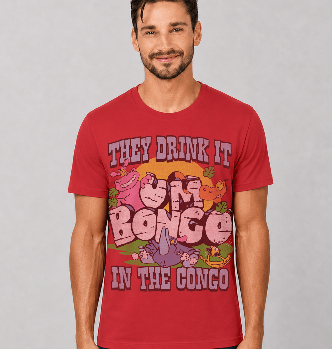 Man wearing an official Um Bongo  red t-shirt with colorful cartoon graphic design and text They Drink It In The Congo. Stood against a beige  background