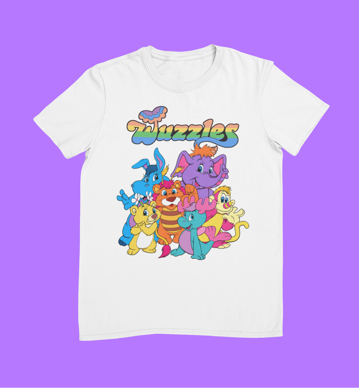 White t-shirt with colourful cartoon characters and 'Wuzzles' text on a purple background